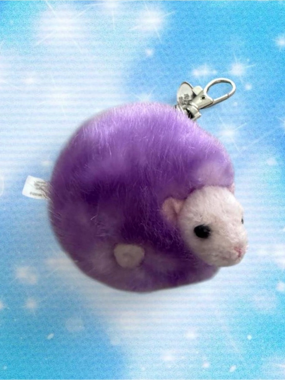 Universal Studios purple Harry Potter
Wizarding World Pygmy Puff Plush keychain